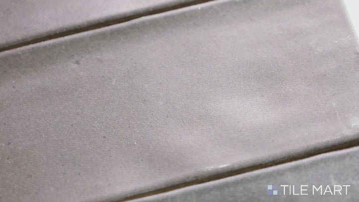 Video featuring Celine Greige 2X6 Matte Glazed Porcelain. A balanced blend of grey and beige in a matte finish, ideal for neutral and modern aesthetics.