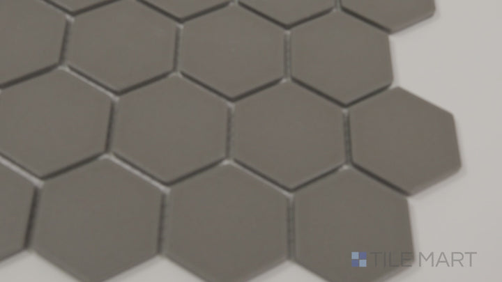 Video of Solids Gray 2-inch Hexagon Matte Porcelain Mosaic. A contemporary gray matte porcelain hexagonal mosaic, creating a structured and sleek aesthetic.
