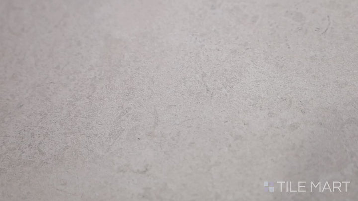 Video of Epika Ivory 12x24 Matte Porcelain. A delicate ivory porcelain tile with a matte surface, creating a soft and timeless aesthetic.