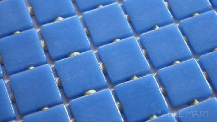 Video of Lisa Azul Claro 1-inch Square Glossy Glass Mosaic. A soft light blue glass mosaic with a high-gloss surface, creating a delicate and modern look.