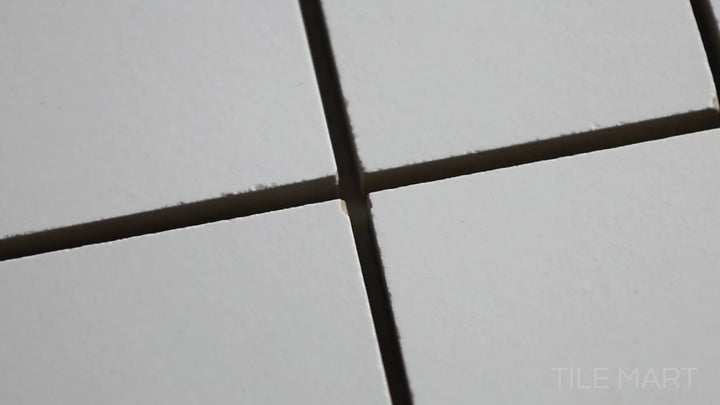 Video of Pearl Super White 2-inch Square Polished Porcelain Mosaic. A glossy white porcelain mosaic with a polished finish, delivering a clean and contemporary style.