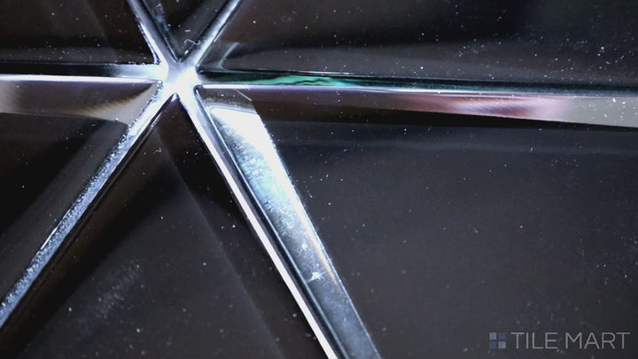 Video showcasing Modern Glass Black 6-inch Triangle Glossy Mosaic. A bold black glass tile with a sleek glossy finish, featuring a unique triangular design for a modern and geometric appeal.