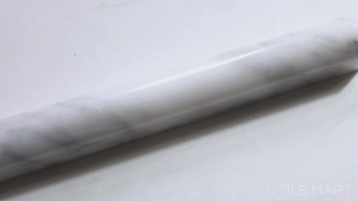 Video featuring Sto-Re Carrara 0.75X12 Polished Marble Pencil. A classic Carrara marble pencil tile with a polished surface, enhancing elegant transitions.