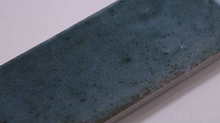 Video highlighting Remedy Hydro 2X10 Glossy Glazed Porcelain. A vibrant glossy porcelain tile with a deep, water-like finish, ideal for contemporary spaces.