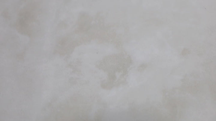 Video of Luxury Kristalus White 24x48 Polished Porcelain. A crisp white polished porcelain tile with subtle veining, delivering a sleek and timeless design.