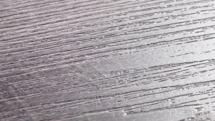 Video showcasing Cyrus Billingham 9X60 Low Gloss Luxury Plank Vinyl. A refined wood-look vinyl plank with warm brown tones and a soft matte finish.