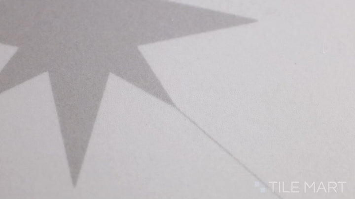 Video showcasing Starburst Llevant Grey 9X9 Matte Porcelain Tile. A geometric tile with a light grey background and dynamic starburst patterns.