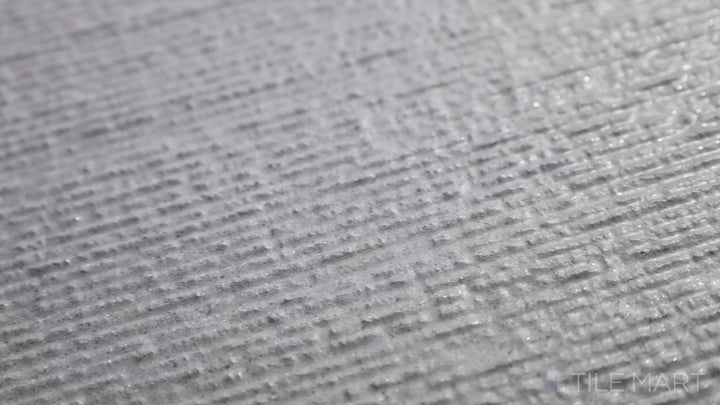 Video highlighting Urban Living Titanium 12X24 Chiseled Porcelain. A deep grey, industrial-style chiseled tile that adds raw sophistication to any space.