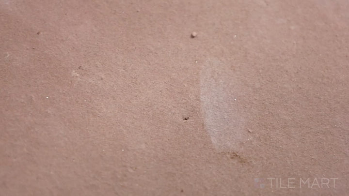 Video of Lincoln Pavers Red 12x12 Stair Coping Natural Terracotta. A handcrafted red terracotta stair coping tile, designed for smooth transitions with a rustic finish.