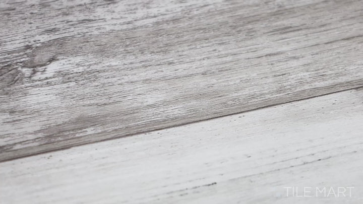 Video of Cyrus Boswell 9X60 Low Gloss Luxury Plank Vinyl. A classic oak-inspired luxury vinyl plank with subtle grain patterns and a natural feel.