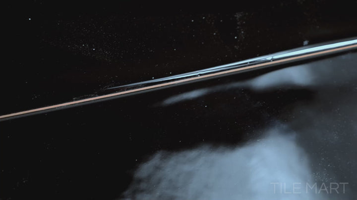 Video featuring Maui Negro 4X21 Glossy Ceramic Tile. A deep black tile with a reflective glossy finish, offering a bold and luxurious aesthetic.