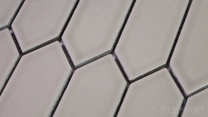 Video showcasing Foundations Pewter Picket Fence Glossy Ceramic Mosaic. A unique picket fence pattern in glossy ceramic, designed to bring sophistication and structure to interior spaces.