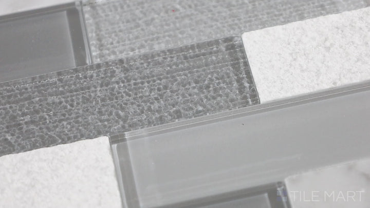 Video featuring Simplystick Mosaix Daphne White And Glass Blend Honed And Polished Marble, Limestone Mosaic. A unique combination of honed and polished marble with glass for added dimension.