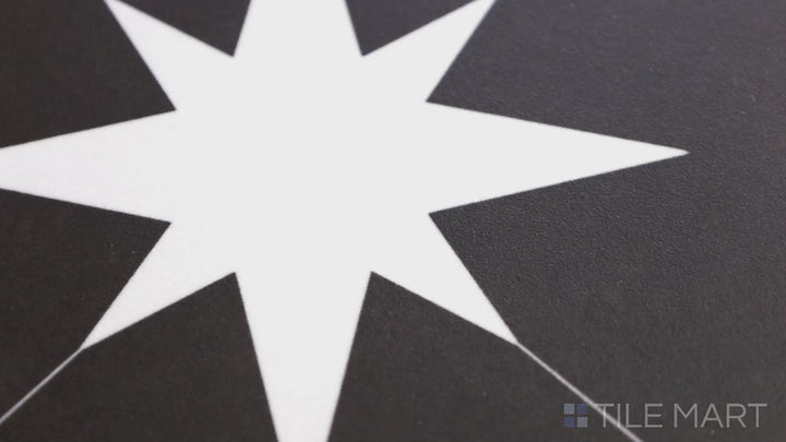 Video showcasing Starburst Ponent Black 9X9 Matte Porcelain Tile. A deep black tile with a symmetrical white starburst pattern, making a bold statement.