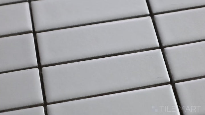 Video showcasing Porcelain Glazed Mosaics White Grid Matte. A clean white matte porcelain grid mosaic, offering a modern and versatile design.