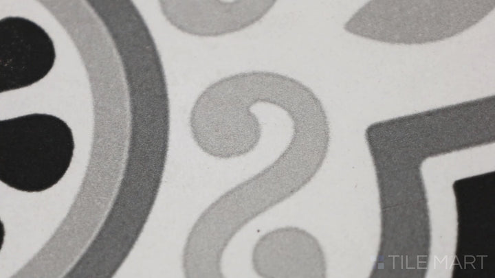 Video of Memoir Crystal Black 12X12 Matte Glazed Ceramic. A deep black matte tile with a refined texture, ideal for elegant and contemporary spaces.