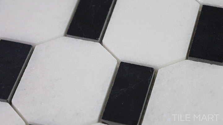 Video showcasing The Finish Line Sable Black Hexagon Polished Marble Mosaic. A deep black polished marble mosaic in a hexagonal shape, adding dramatic contrast and style.