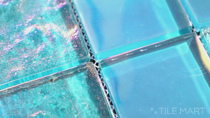 Video featuring Vidrofina Ocean Blue 2" Square Glossy Glass Mosaic. A rich blue mosaic with a glossy sheen, adding a bold and refreshing touch to backsplashes and feature walls.