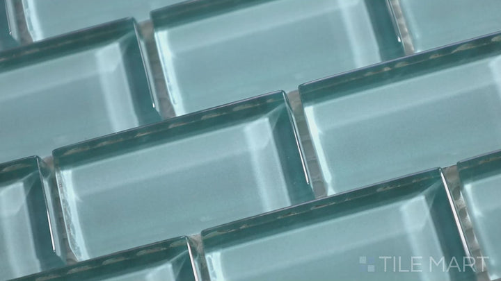 Video featuring Vidrofina Larimar Green Brick Glossy Glass Mosaic. A refreshing green-toned glass brick mosaic with a lustrous finish, adding a vibrant touch to walls and backsplashes.