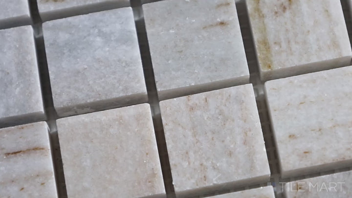 Video highlighting Sto-Re Ocean White 5/8" Mini Square Polished Marble Mosaic. A pristine Ocean White marble mosaic with polished mini square tiles, creating a luminous surface.