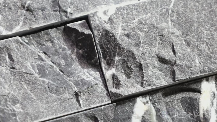 Video of Rockmount Marquina Nero 6X24 Stacked Stone Panel Splitface Marble. A bold black marble stacked stone panel with dramatic white veining for a luxurious touch.