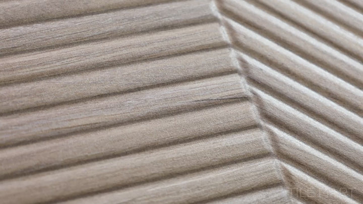 Video highlighting Tangram Camel 12.2X39.37 Matte Ceramic. A warm-toned ceramic tile with a matte finish, offering a wood-inspired texture for natural aesthetics.