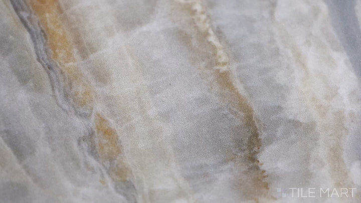 Video highlighting Exotic Stone Onice Fantastico 24x48 Polished Porcelain. A dramatic polished porcelain tile with warm tones and flowing veining, inspired by exquisite onyx stone.