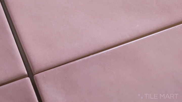 Video highlighting Village Rose Gold 5X5 Glossy Ceramic. A warm pink-toned square tile with a glossy sheen for a modern, elegant design.