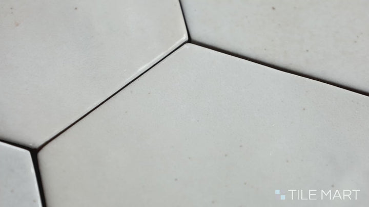 Video of Celine White 4" Hex Gloss Glazed Porcelain. A crisp white glossy hex tile that reflects light beautifully, creating a bright and elegant look.