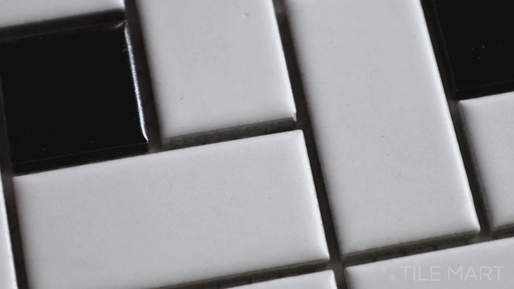 Video showcasing Porcelain Glazed Mosaics White with Black Dot Pinwheel Matte. A geometric pinwheel pattern in white matte porcelain with black dots, adding a dynamic and classic touch.