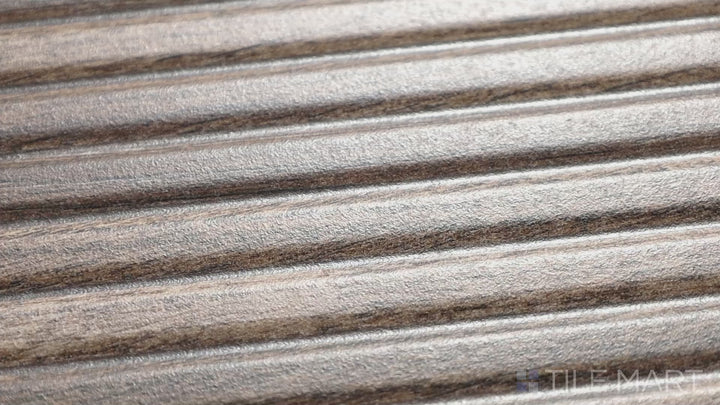 Video featuring Ribbon Wood Coffee 12.4X39.4 Matte Ceramic. A rich brown wood-look tile with a matte finish, offering timeless appeal for flooring and walls.