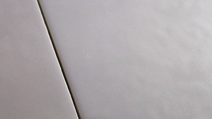 Video featuring Kite Dark Grey 4x12 Matte Porcelain. A rich dark grey matte porcelain tile with a smooth texture, offering a contemporary and sophisticated appeal.