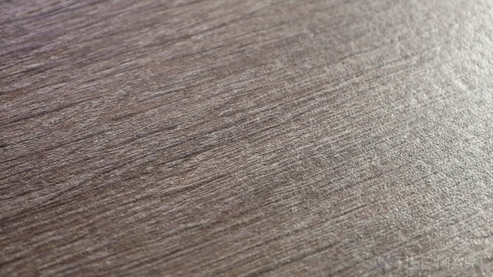 Video showcasing Century Wood Look Brown 9.84x59.1 Matte Porcelain. A rich brown wood-look porcelain tile with a matte texture, delivering a classic and timeless hardwood appearance.