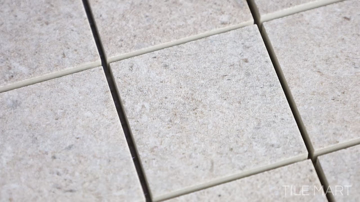 Video showcasing Epika Almond 2-inch Square Matte Porcelain Mosaic. A warm almond-colored porcelain mosaic with a matte surface, adding texture and a refined look.