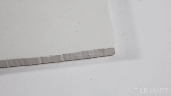 Video featuring Zellige Neo Gesso 4X4 Glossy Glazed Ceramic. A crisp white glossy ceramic tile that enhances brightness and complements any design aesthetic.