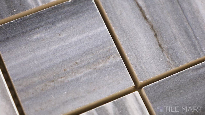 Video showcasing Exotic Stone Nawan Kendo Blue 2-inch Square Polished Porcelain Mosaic. Featuring rich blue hues and a polished finish, this high-quality porcelain tile offers a sleek, elegant look with durability and timeless appeal.