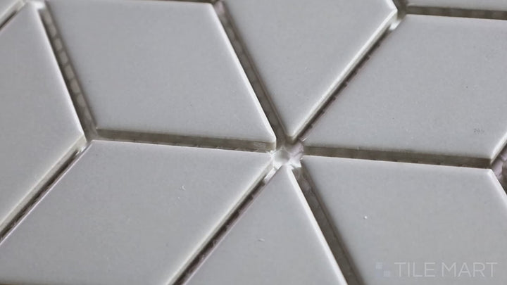 Video showcasing Shapes Light Gray Cube Matte Porcelain Mosaic. A soft gray matte porcelain mosaic with a 3D cube effect, adding texture and depth.