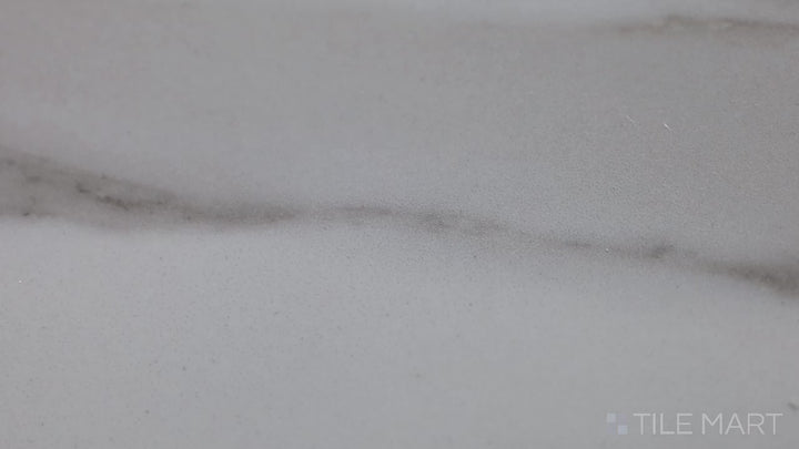 Video featuring Tele Di Marmo Reloaded Calacatta 12X24 Polished Porcelain. A striking white marble-look tile with a polished surface for a high-end, glossy finish.