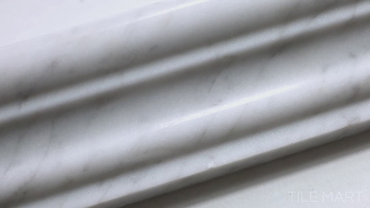 Video highlighting Sto-Re Carrara 2.5X12 Polished Marble Chair Rail. A classic Carrara marble chair rail tile with a polished finish, enhancing architectural details.