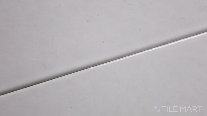 Video showcasing Zenia Milky Way 2.5X9 Gloss Glazed Porcelain. A celestial white glossy tile with a reflective finish, perfect for bright and modern interiors.