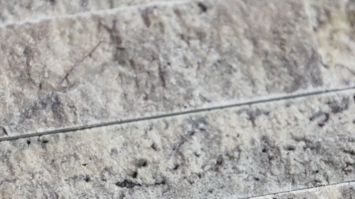 Video of Rockmount White Oak 6X24 Stacked Stone Panel Splitface Marble. A refined white marble stacked stone panel with a textured splitface finish.