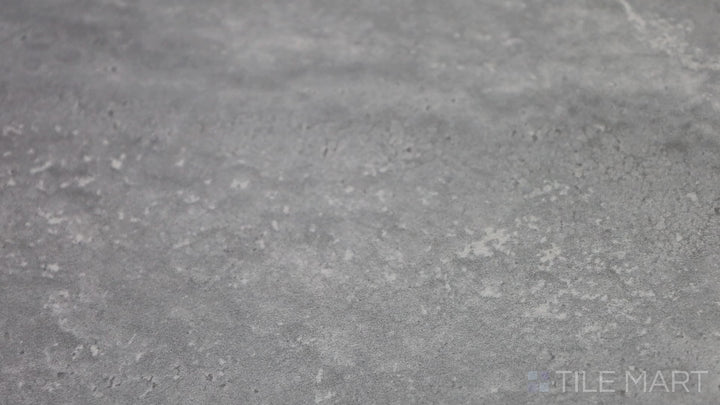 Video featuring Navo Grigio 12X24 Matte Porcelain Tile. A contemporary gray tile with a refined matte texture, ideal for sleek and industrial interiors.