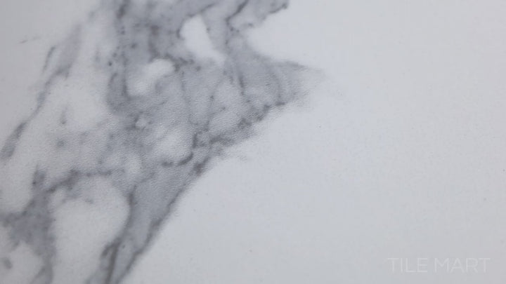 Video featuring Select White Carrara 24x24 Matte Porcelain. A refined white Carrara-style matte porcelain tile with subtle veining for a natural stone look.