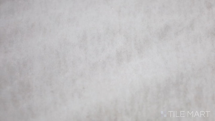 Video showcasing Exotic Stone Da Vinci White 24x48 Polished Porcelain. A bright white polished porcelain tile with subtle veining, exuding elegance and a timeless marble-like appearance.