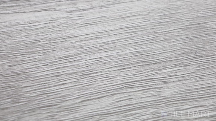 Video featuring Cyrus Brianka 7X48 Low Gloss Luxury Plank Vinyl. A versatile wood-look luxury vinyl plank with neutral tones and natural grain variations.