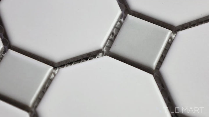 Video of Domino Gray & White 2" Octagon Matte Porcelain Mosaic. A soft-toned octagon tile with white accents and a matte finish for a classic look.