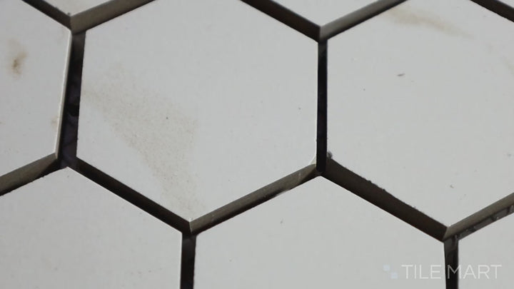 Video featuring Eden Calacatta 2" Hexagon Matte Porcelain Mosaic. A white marble-inspired hex tile with a soft matte surface, adding texture and depth.