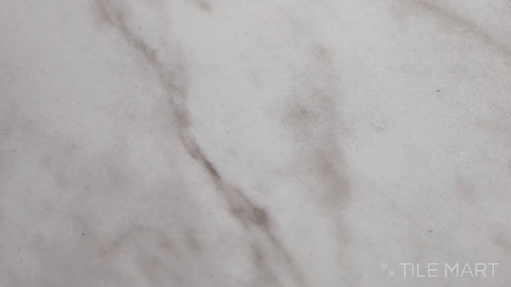 Video highlighting Kaya Carrara Bianco 12X24 Matte Porcelain. A subtle white Carrara-inspired porcelain tile with a soft matte surface, perfect for elegant interiors.