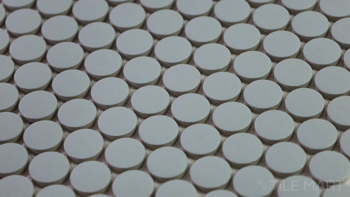 Video showcasing Marin Misty Blue 3/4" Penny Round Matte Glazed Porcelain Mosaic. A calming blue mosaic tile that adds a soft and serene touch to any space.