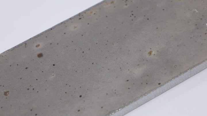 Remedy Zen 2x10 glossy glazed porcelain tile in video highlighting its elongated form and shifting light on the glossy finish.